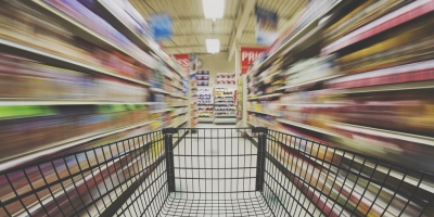 shopping cart moving through aisle