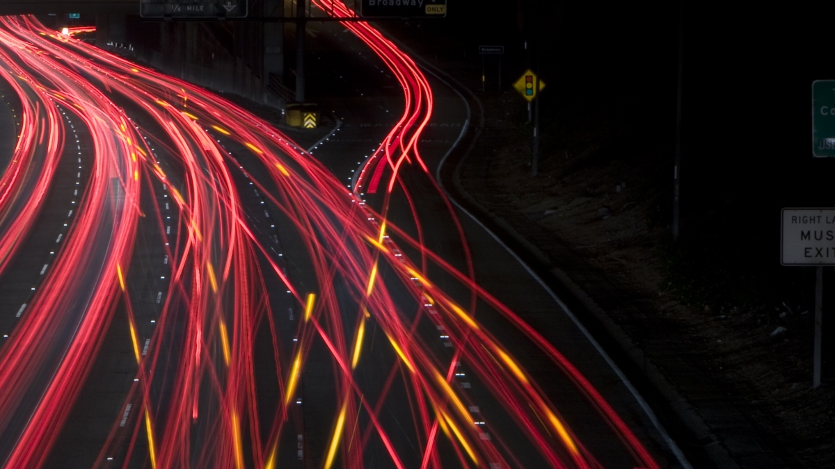 night highway traffic at exit