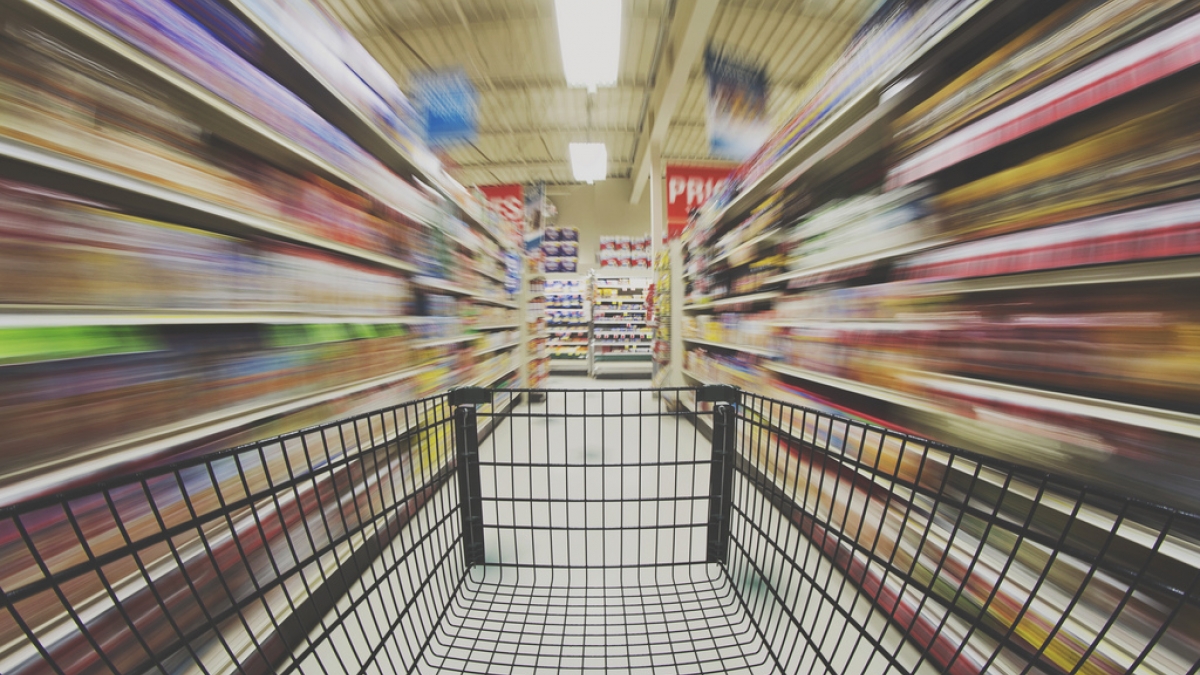 shopping cart moving through aisle